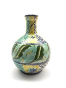 Della Robbia bottle shaped vase painted and incised with stylised leaf and scaled decoration