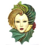 Painted pottery face mask modelled as a lady wearing an elaborate headdress