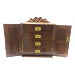Late Victorian walnut specimen or cutlery cabinet with carved pediment