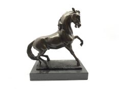 Bronze figure modelled as a prancing horse