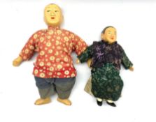 Two Chinese Dolls with composition heads
