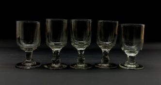 Set of three early 19th century glass rummers