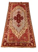 Persian design red ground rug