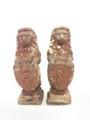 Pair of reconstituted stone garden lions