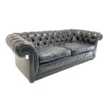 Tetrad Chesterfield three seat sofa upholstered in deep buttoned black leather with squab cushions W