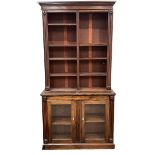 Early Victorian mahogany library bookcase on cupboard