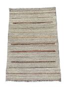 Flat weave brown ground rug