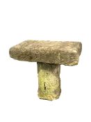 Roughly hewn stone garden table