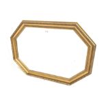 20th century octagonal gilt framed wall mirror with moulded frame enclosing bevelled mirror plate 89
