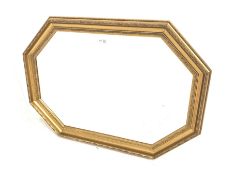 20th century octagonal gilt framed wall mirror with moulded frame enclosing bevelled mirror plate 89