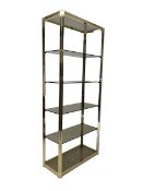 Mid century Hollywood Regency brass etagere with five inset frosted glass shelves