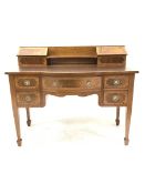 Carlton House style inlaid mahogany break bow front desk