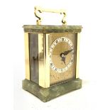 An 'Elliott' early 20th century brass and onyx carriage time piece clock