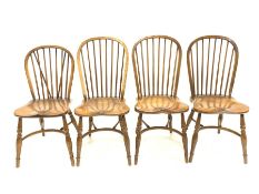 Matched set four 20th century elm Windsor dining chairs