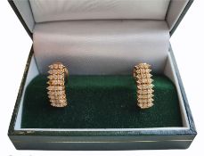 Pair of 14ct gold diamond pendant stud earrings