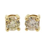 Pair of 18ct gold round brilliant cut diamond stud earrings