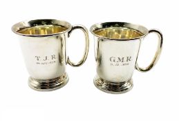 Pair of plain silver mugs with loop handles H7cm Sheffield 1957 Maker Viners Ltd 6.4oz