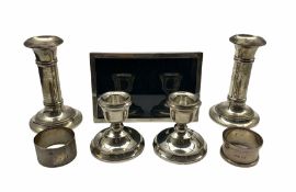 Pair of silver candlesticks with plain columns and circular foot H12cm Birmingham 1925 Maker Martin