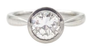 Platinum bezel set round brilliant cut diamond