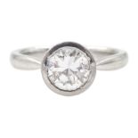 Platinum bezel set round brilliant cut diamond