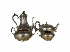 Victorian silver four piece tea and coffee set of compressed circular form with engraved decoration