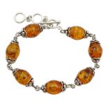 Silver oval Baltic amber link bracelet