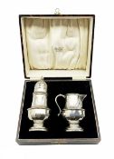 Silver vase shape sugar castor with pierced cover H16cm and matching cream jug Birmingham 1932 Maker