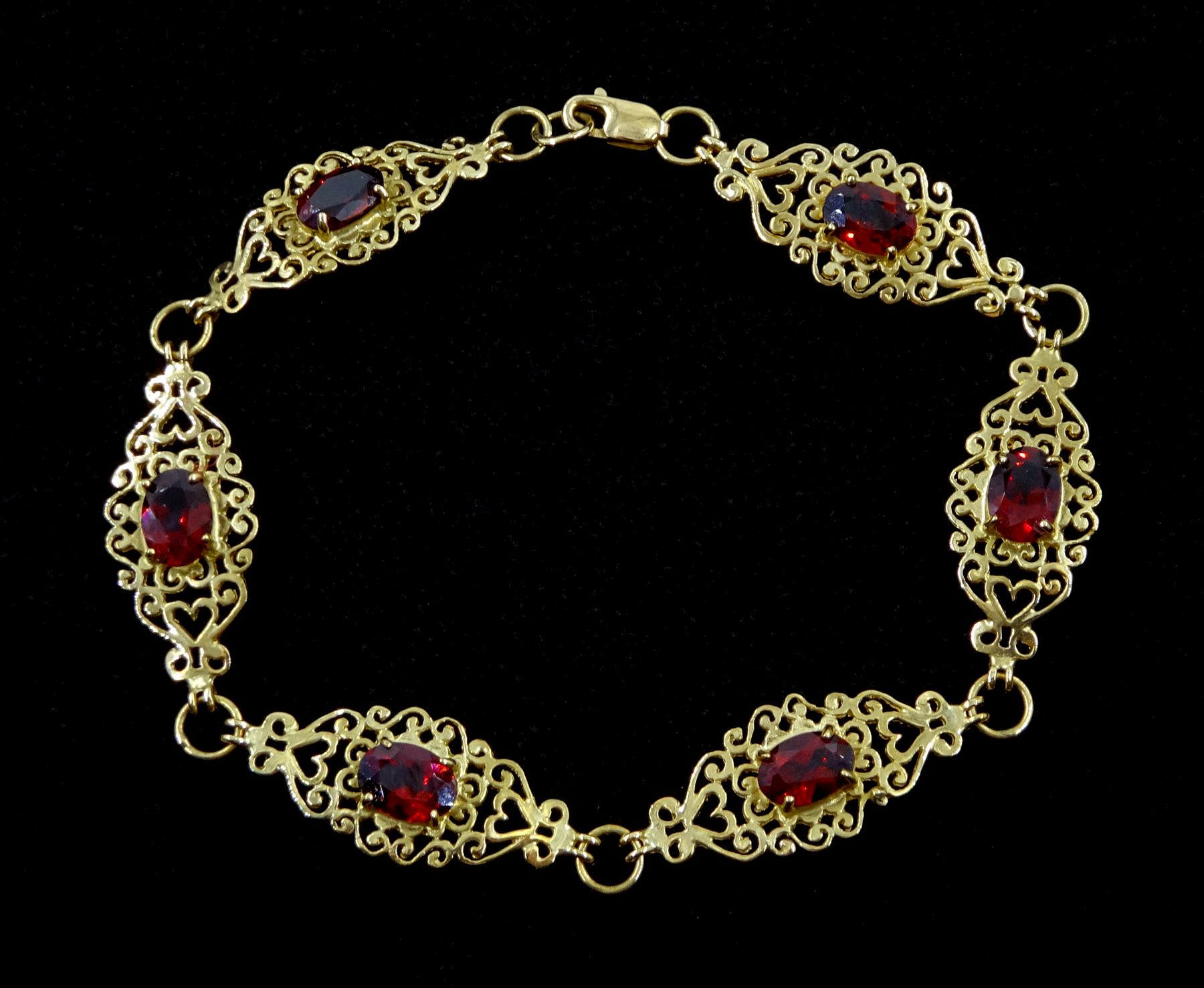 9ct gold oval garnet link bracelet