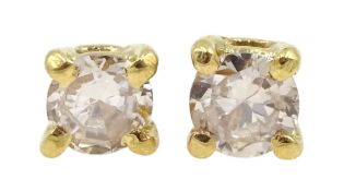 Pair of 18ct gold diamond stud earrings