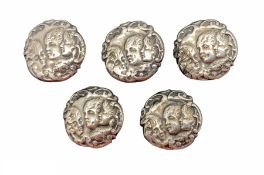 Set of five Edwardian silver buttons with embossed cherubs heads Birmingham 1902 Maker Levi & Salama