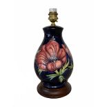 Moorcroft Anenome pattern baluster form table lamp on blue ground