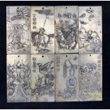 Set of eight Chinese silvered metal pendants or plaques each depicting the animals of the Chinese Ca