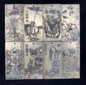 Set of eight Chinese silvered metal pendants or plaques each depicting the animals of the Chinese Ca