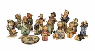 Collection of Hummel figures including Apple Tree Boy