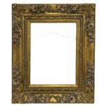 Gilt picture frame moulded with shells and flower heads