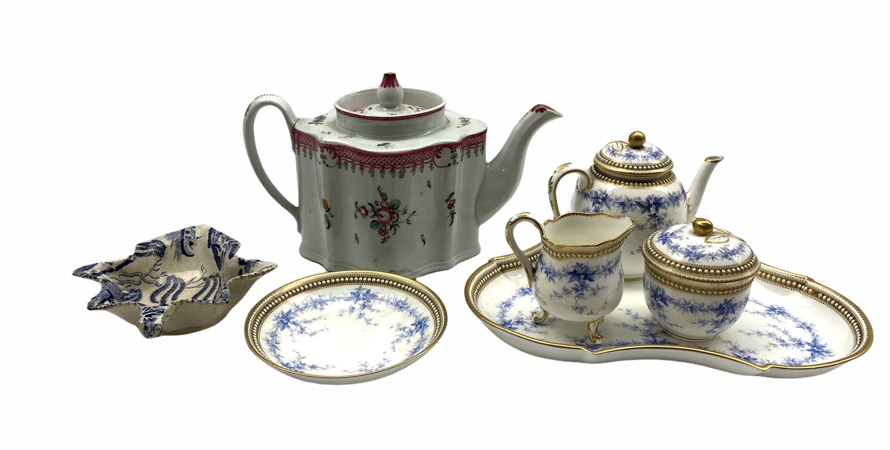 Victorian Royal Worcester part cabaret set decorated with trailing blue leaves within a jewelled bor