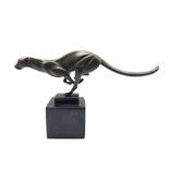 Stylised bronze figure of a running Cheetah with foundry mark on a marble base H19cm