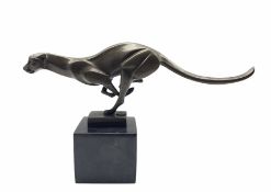 Stylised bronze figure of a running Cheetah with foundry mark on a marble base H19cm