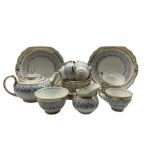 New Chelsea tea set decorated with trailing leave within a gilt band comprising seven cups