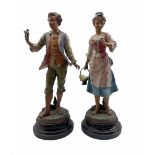 Pair of 19th century French painted spelter figures 'Belle Fermiere' and 'Galant Jardinier' H48cm