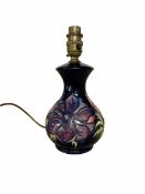Moorcroft Anenome pattern baluster form table lamp on blue ground