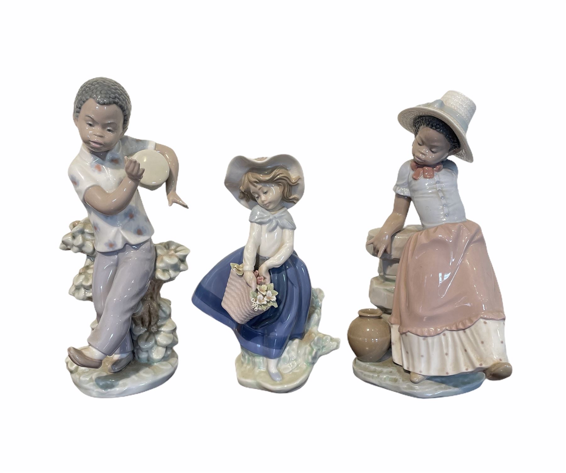 Pair of Lladro figures designed by Jose Roig 'Bongo Beat' No5157 and 'A Step in Time' No.5158 and a