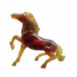 Daum Pate de Verre model of a prancing horse in tonal amber and green