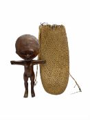 Papua New Guinea fishing bag and an African carved fertility figure H35cm