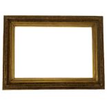 Large moulded gilt frame with flowerhead and leaf decoration