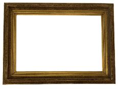Large moulded gilt frame with flowerhead and leaf decoration