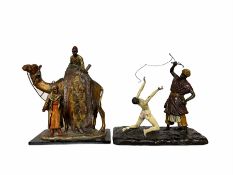After Bergmann - Spelter table lighter in the form of a carpet seller with camel and rider H19cm and