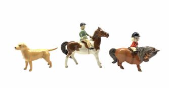 Beswick figure of a girl on skewbald pony