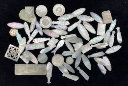 Collection of 19th century Chinese mother-of-pearl gaming counters in various shapes to include fish