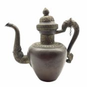 Tibetan patinated copper ewer or teapot with moulded Dragon handle and spout